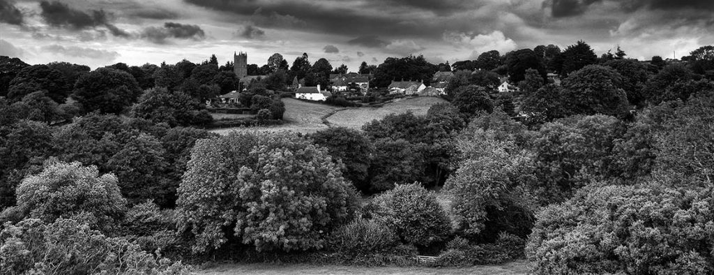 Summer storm clouds approaching North Bovey village, Dartmoor, Devon, August 2011.